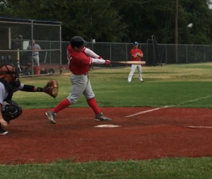 Eli B playing baseball