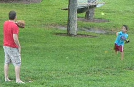 father and son playing catch